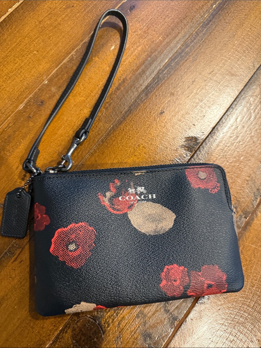 Coach Black Floral Wristlet with Red and Cream Accents